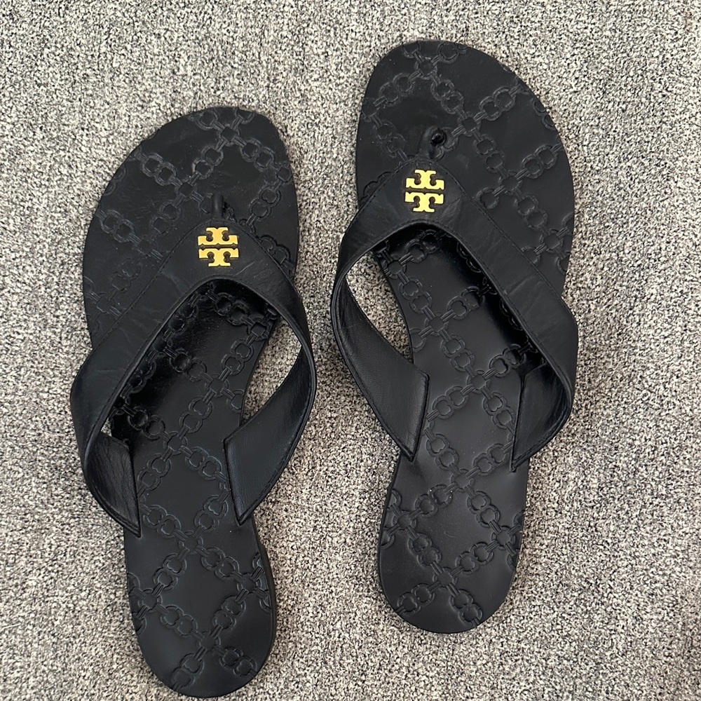 Tory Burch Black Flip Flops with Gold Emblem